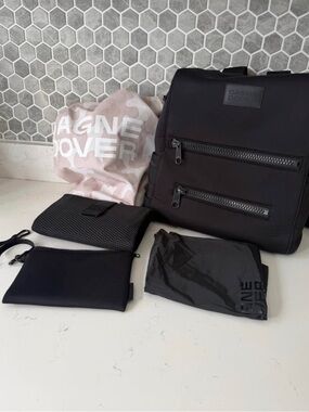 Dagne Dover Black Backpack with Pink Camo Logo Dust Bag